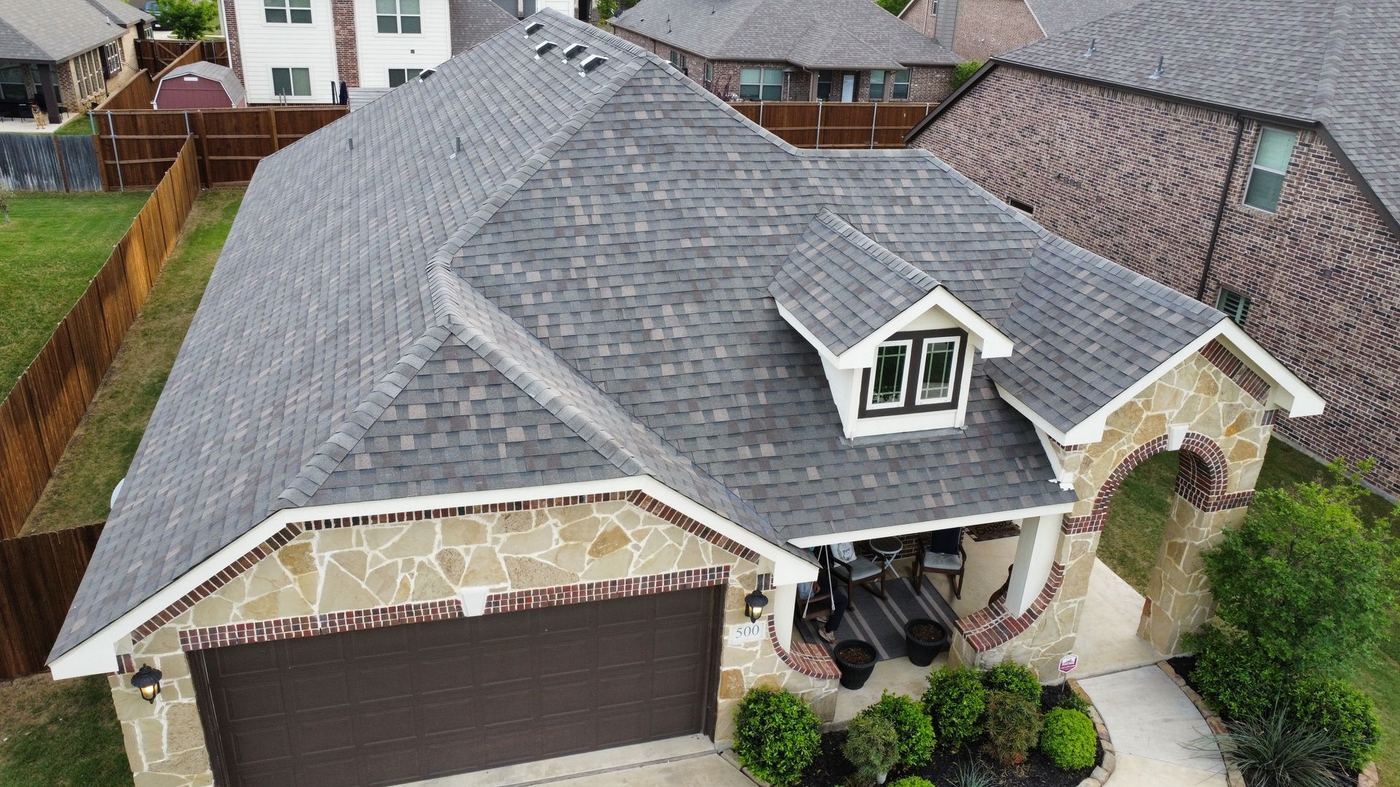 Completed residential roof replacement after shingle tear-off