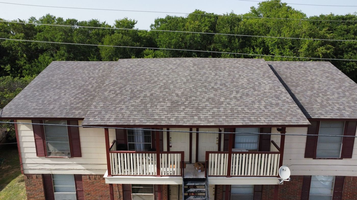 Finished roof on a brick and stone home