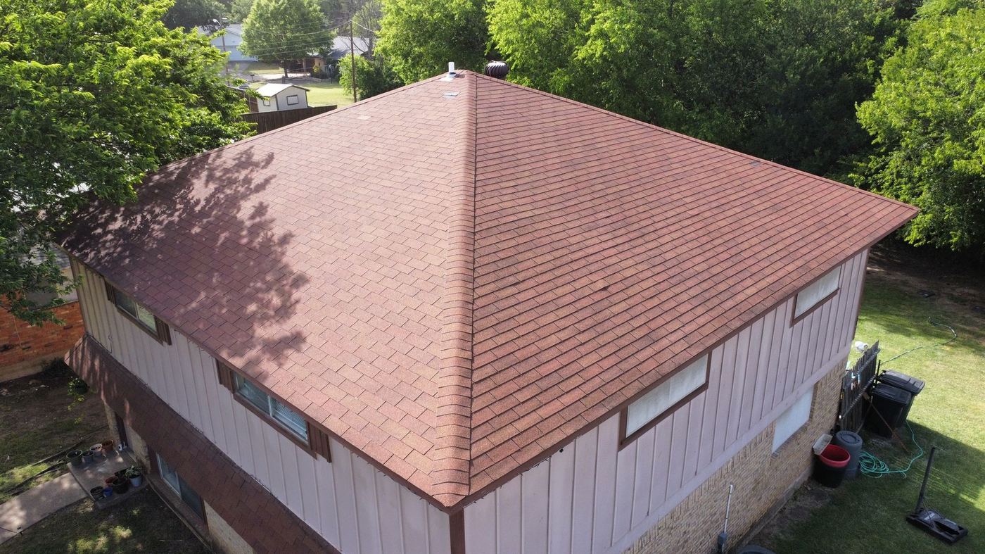 Roofing materials staged on a job site