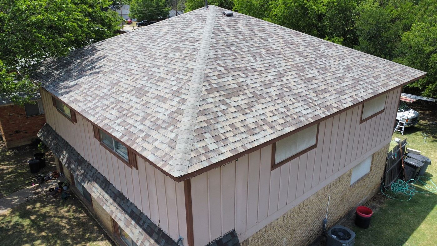 Aerial view of a completed shingle roof